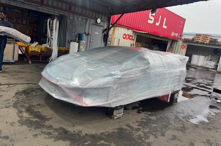 A vehicle fully wrapped in protective material